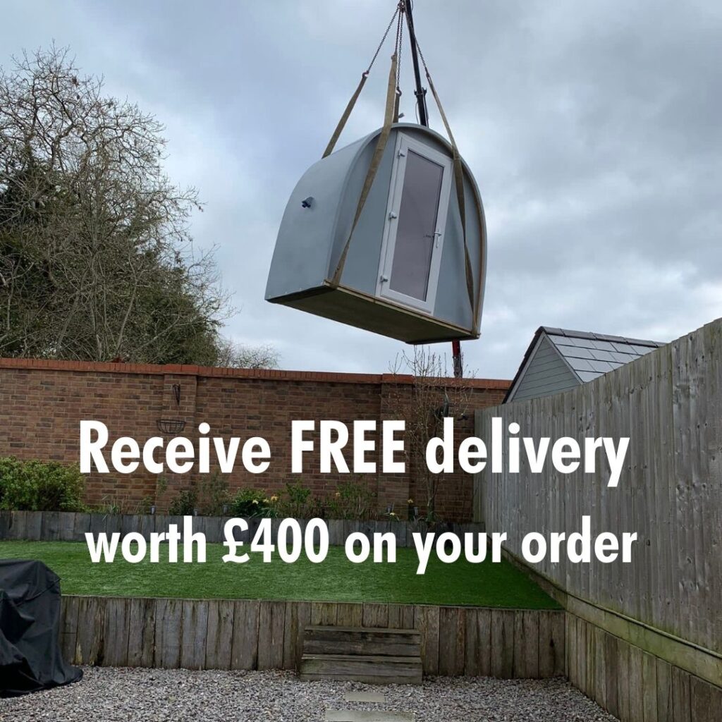Hully Pods sale image for cheap garden Pods in the U.K. | Text reads: Free delivery -- a £400 value. Image: Dory Office Pod being delivered over fence by crane. 