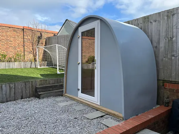 Gravel base foundation for a garden pod