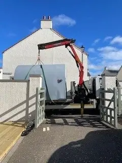 Crane lifting Skipjack Pod